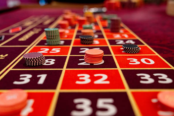 Live dealer studio interface on a mobile device with table information